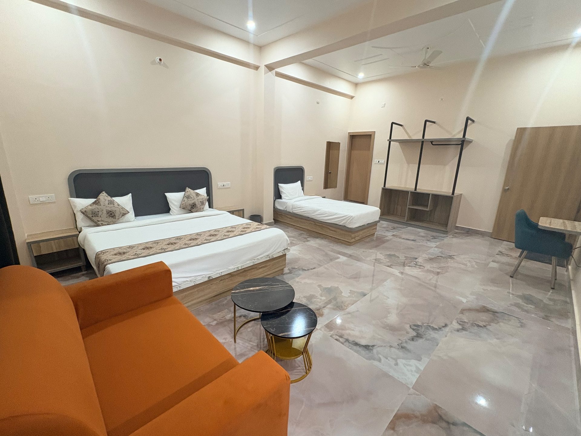 Classic Room — beds, sofa and open wardrobe