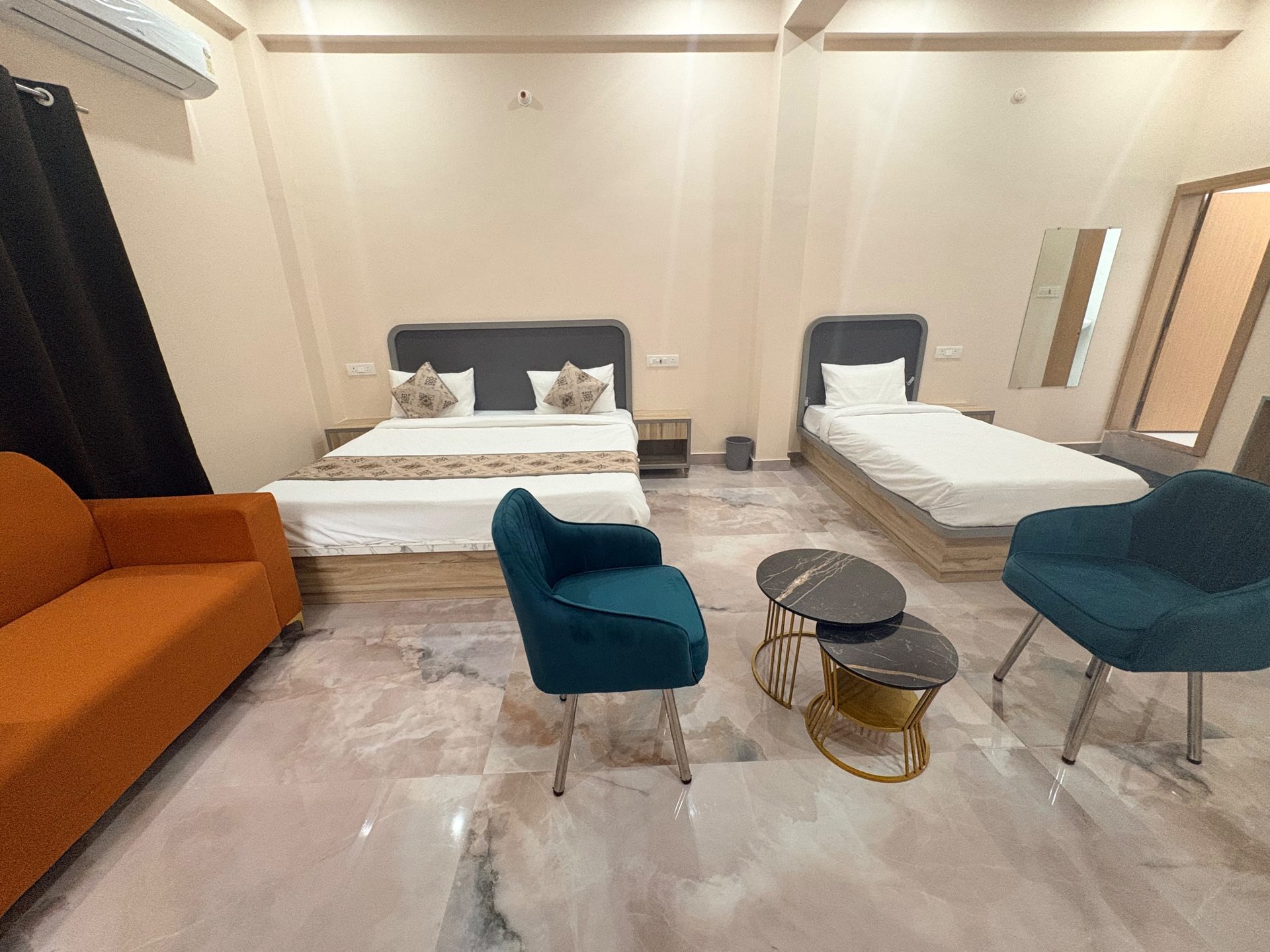 Classic Room seating with teal armchairs