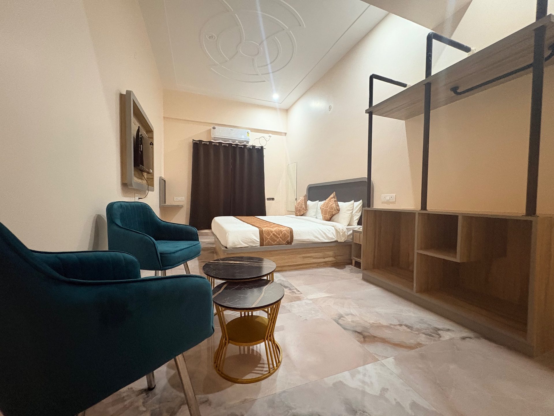 A Deluxe Room at City Comfort Hotel, made up and ready